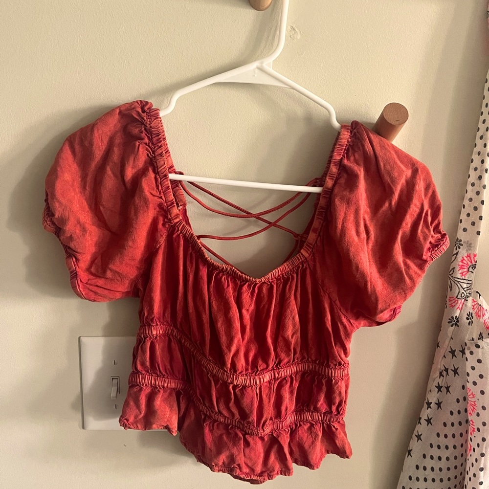 cropped orange red blouse with puffy sleeves